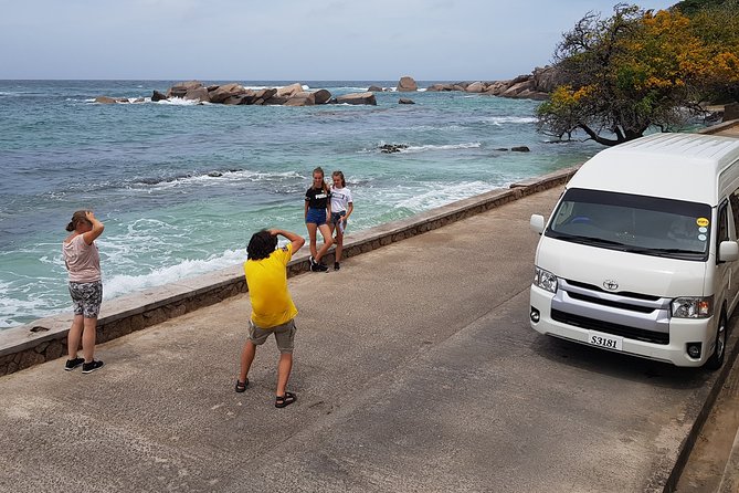Taxi Services & Transfers on Praslin Island - Airport meeting made easy, with signboard and logo